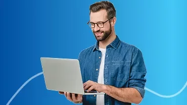 Banner della guida all’onboarding con un uomo che utilizza un laptop.