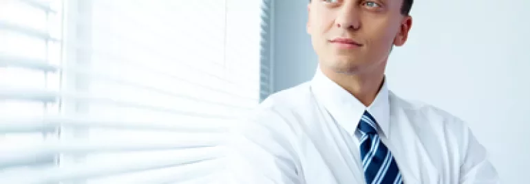 young-businessman-by-the-window